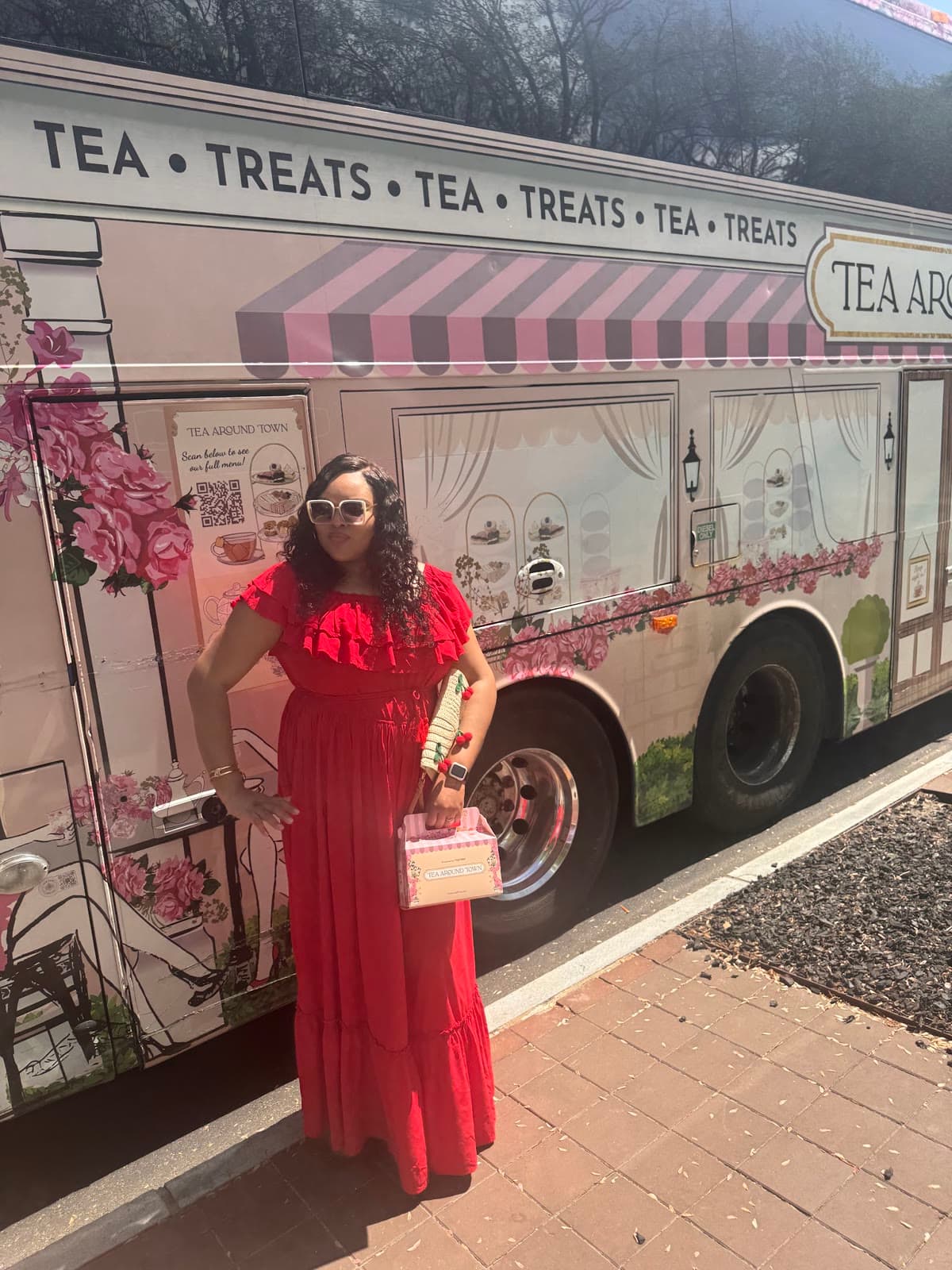 LIPSC member in red outside the Tea Around Town bus